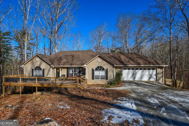 ranch-style home with a garage