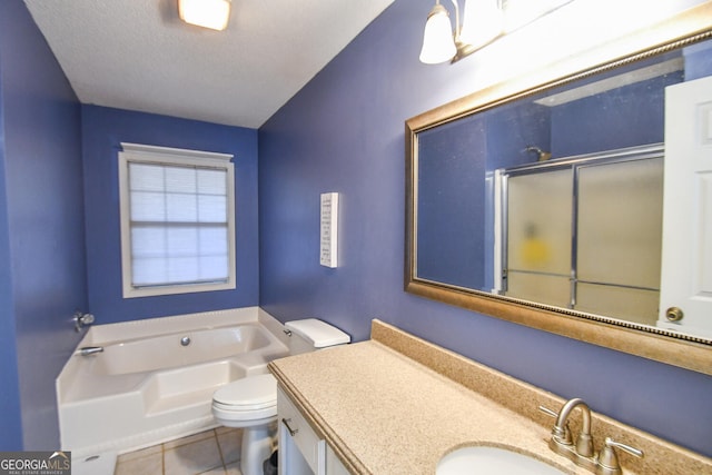 full bathroom featuring independent shower and bath, tile patterned flooring, vanity, and toilet