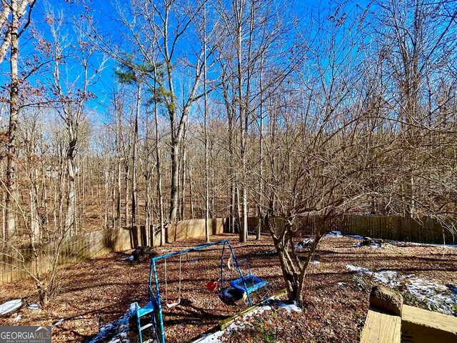 390 Apple Rdg Unit 2, Dawsonville, GA 30534 - view of yard with fence and a playground