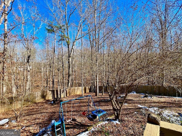 view of yard covered in snow