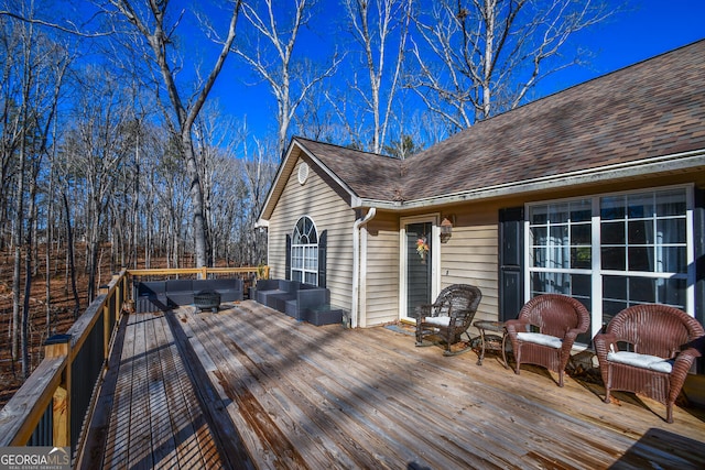 deck with an outdoor hangout area