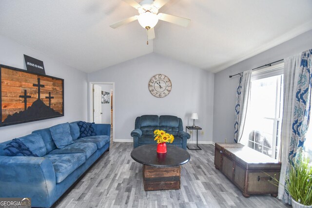 390 Apple Rdg Unit 2, Dawsonville, GA 30534 - living area featuring lofted ceiling, wood finished floors, a ceiling fan, and baseboards