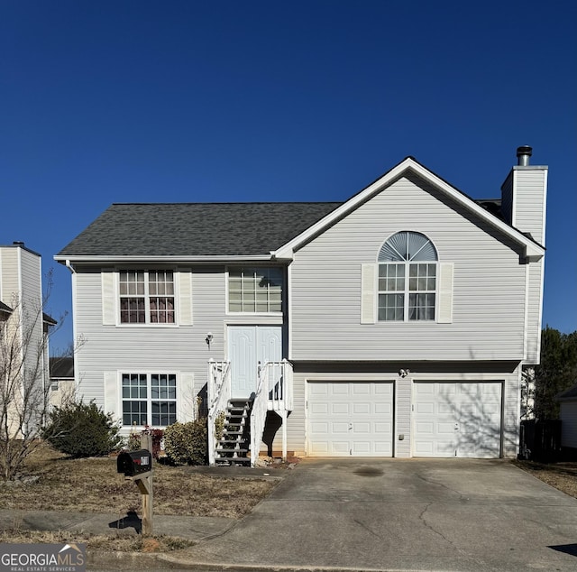 bi-level home featuring a garage