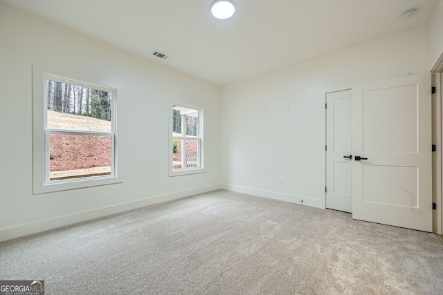 view of carpeted spare room