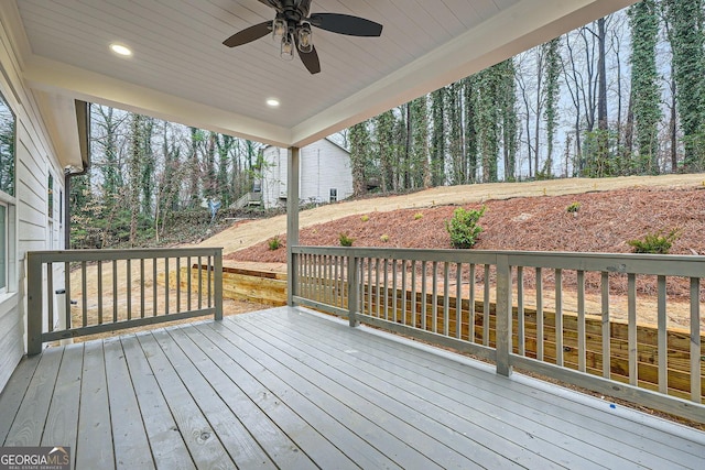 wooden deck with ceiling fan