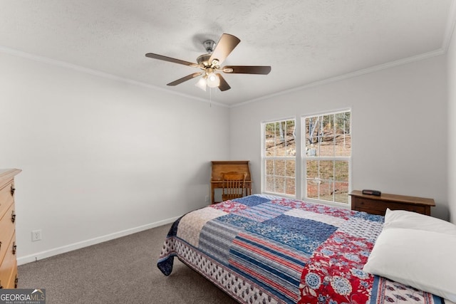 bedroom with a textured ceiling, ceiling fan, carpet, and ornamental molding