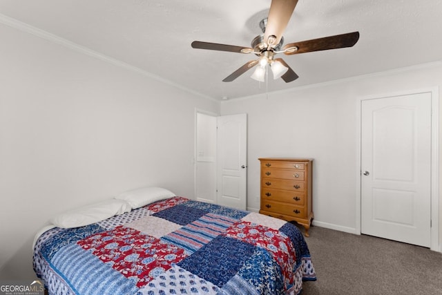 bedroom featuring carpet floors, ceiling fan, and crown molding