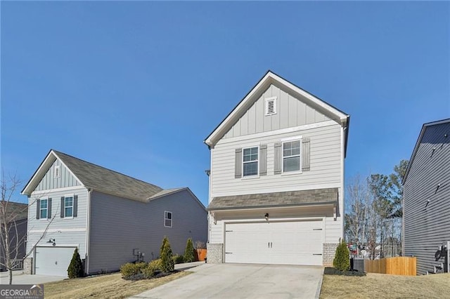 view of front of property featuring a garage and cooling unit