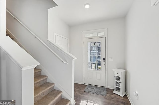 foyer featuring dark hardwood / wood-style floors