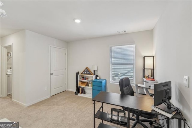 office area with light colored carpet