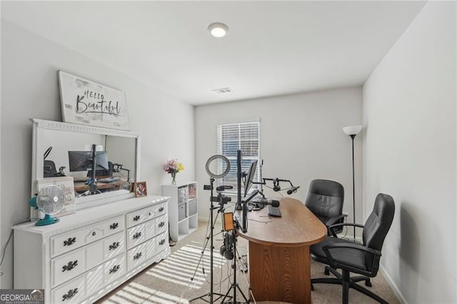 home office featuring light colored carpet