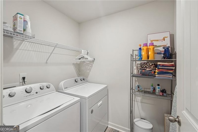 washroom featuring independent washer and dryer