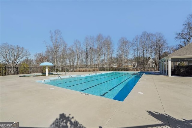 view of pool featuring a patio