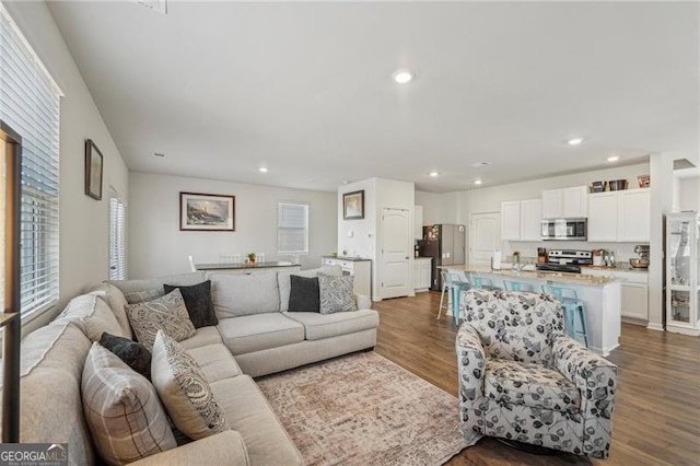 living room with hardwood / wood-style flooring