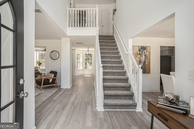 foyer entrance with light wood-type flooring