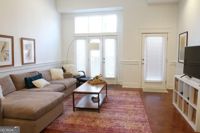 living room with a high ceiling