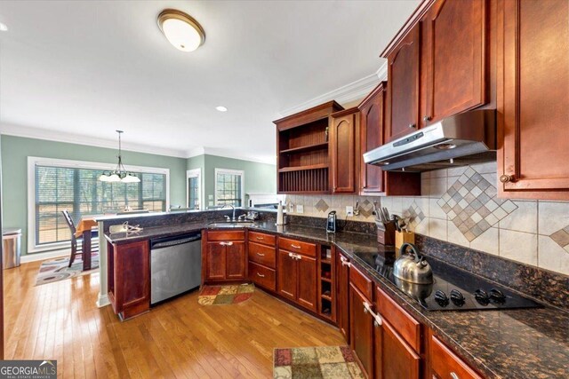 kitchen with sink, decorative light fixtures, ornamental molding, dishwasher, and decorative backsplash