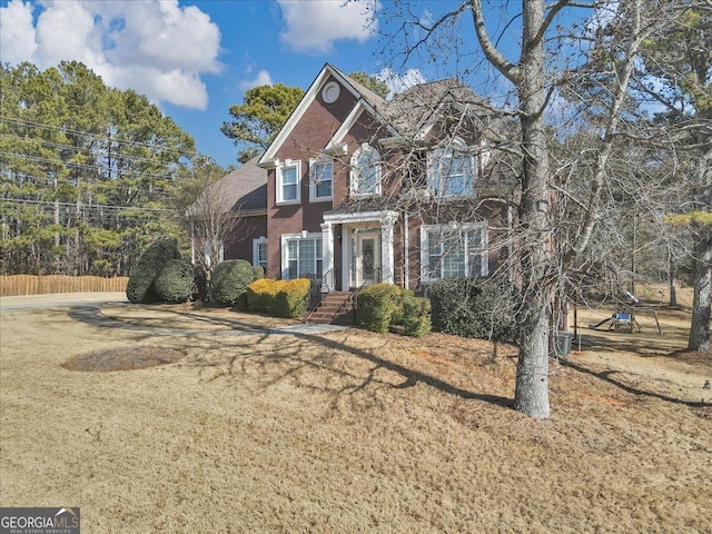 view of front of house with a front lawn