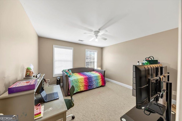 carpeted bedroom with ceiling fan