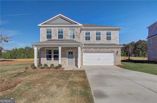 view of front facade featuring a garage and a front yard