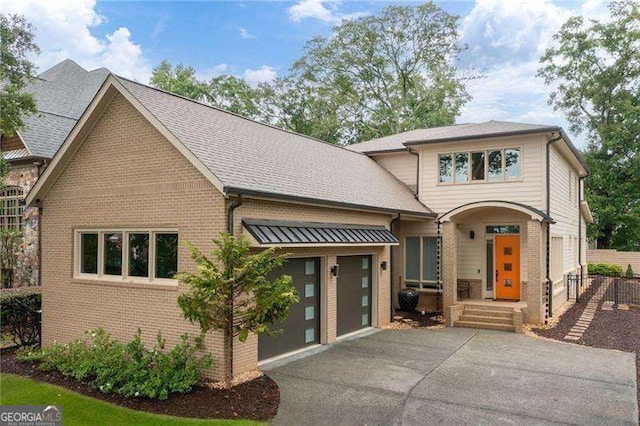 view of front of property featuring a garage