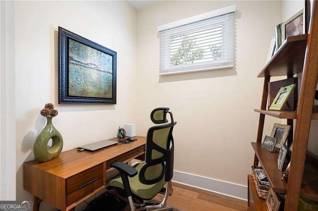 home office featuring hardwood / wood-style flooring