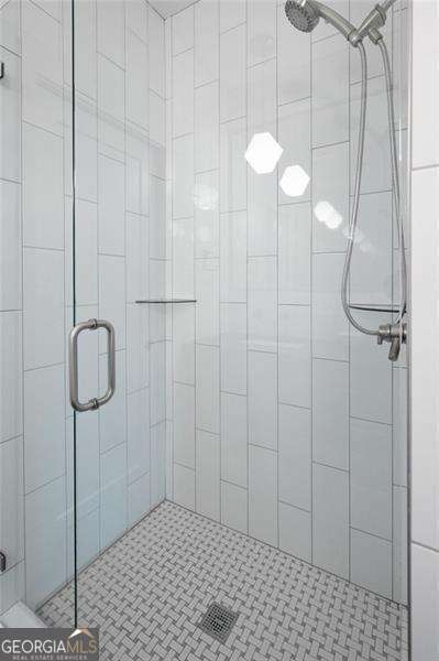 bathroom with walk in shower