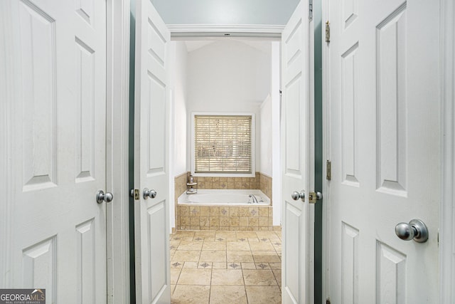 bathroom featuring tiled bath