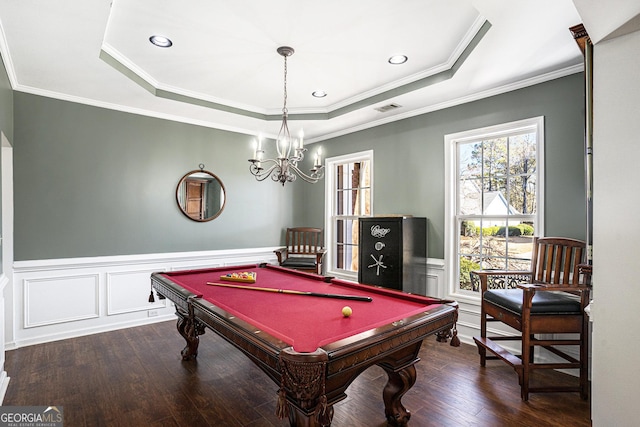 game room featuring crown molding, billiards, a tray ceiling, and dark wood-type flooring