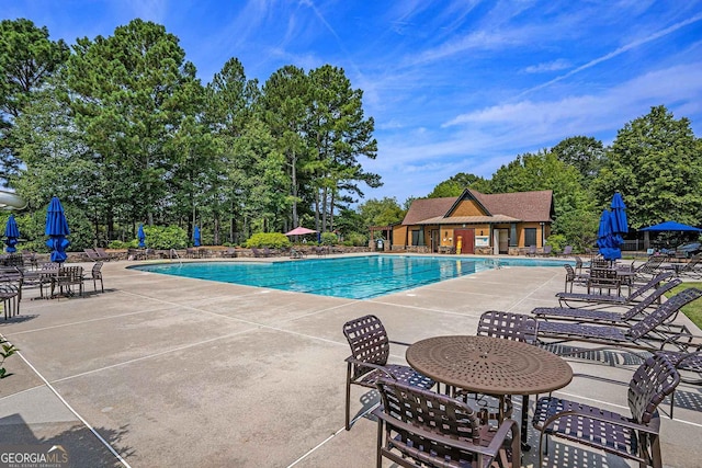 view of pool featuring a patio area