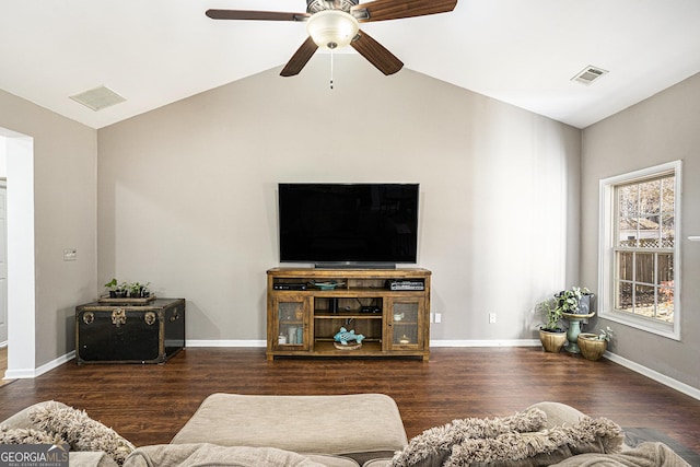 living room featuring lofted ceiling, dark wood-type flooring, and ceiling fan