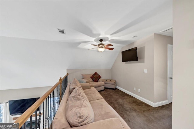 living room with ceiling fan, dark carpet, and lofted ceiling