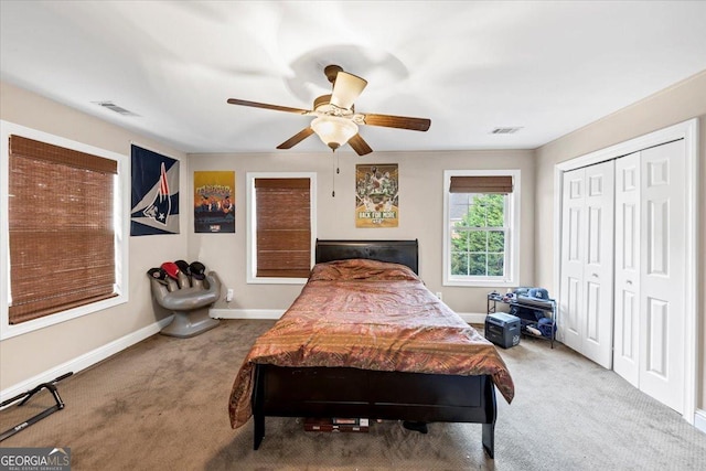 bedroom featuring carpet, a closet, and ceiling fan