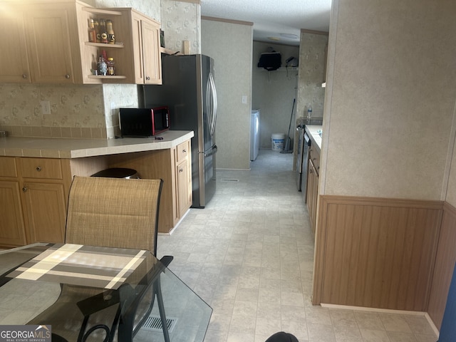 kitchen with light brown cabinetry