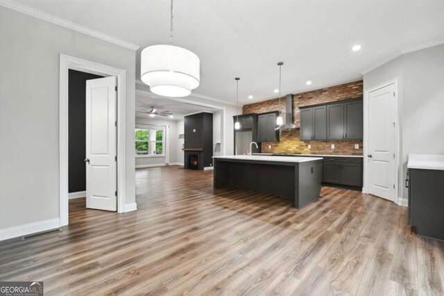 unfurnished bedroom with french doors, a closet, connected bathroom, light colored carpet, and ornamental molding