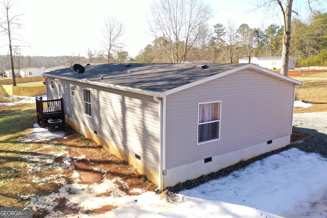 view of snow covered property