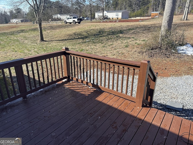 deck featuring a lawn