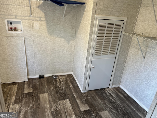 laundry area with hookup for a washing machine and dark wood-type flooring