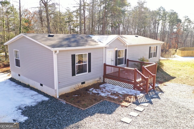 view of front of property featuring a deck