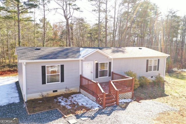 view of front of house with a deck