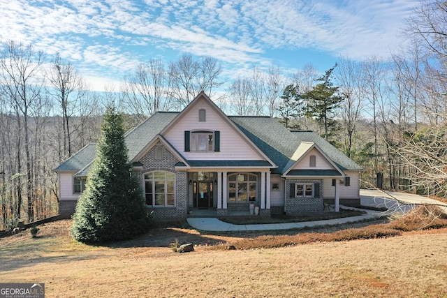 view of front of home featuring covered porch