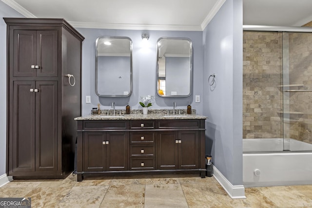 bathroom featuring ornamental molding, bath / shower combo with glass door, and vanity