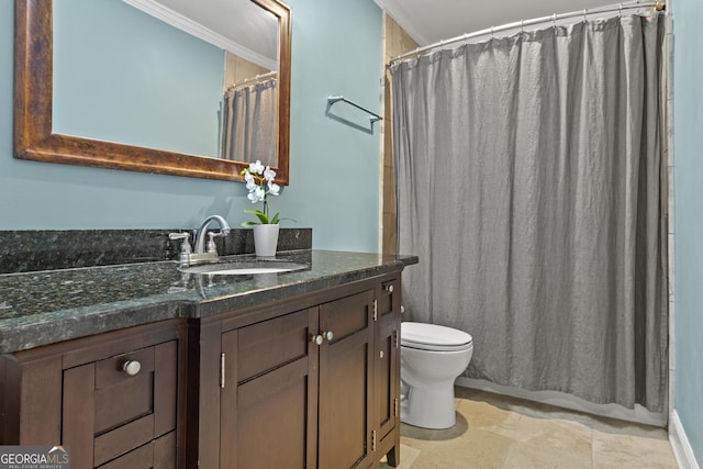 bathroom featuring crown molding, vanity, toilet, and a shower with curtain