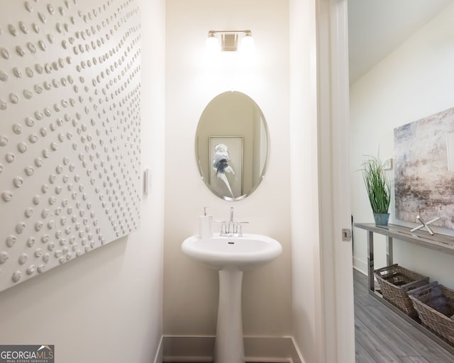 bathroom featuring hardwood / wood-style flooring