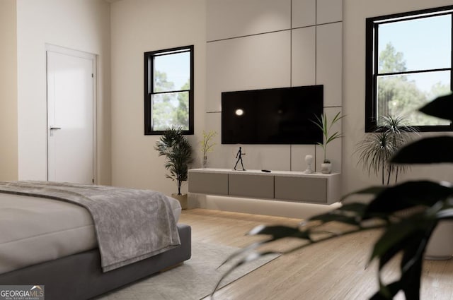 bedroom with light wood-type flooring