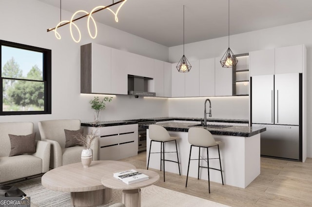 kitchen featuring white cabinets, sink, and appliances with stainless steel finishes