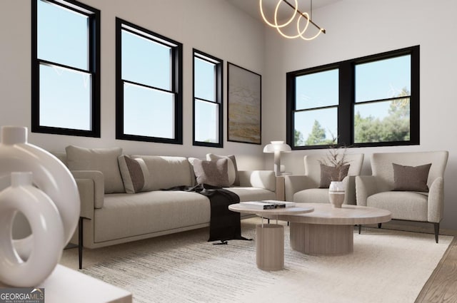 living room featuring hardwood / wood-style floors and a notable chandelier