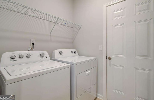 laundry room with washing machine and dryer