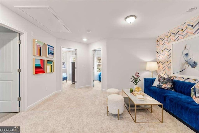 living room featuring light carpet