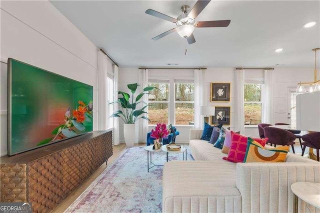 living room with ceiling fan